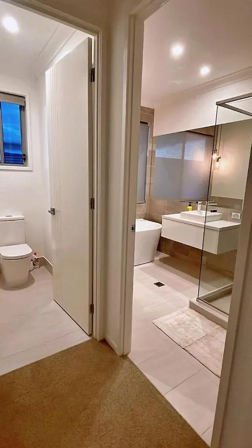Quarto em Acomodações Particulares Grand Residences Near Helensvale Train *